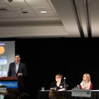 The panelists and audience listen in as Steve Goreham speaks on the factors of climate change.